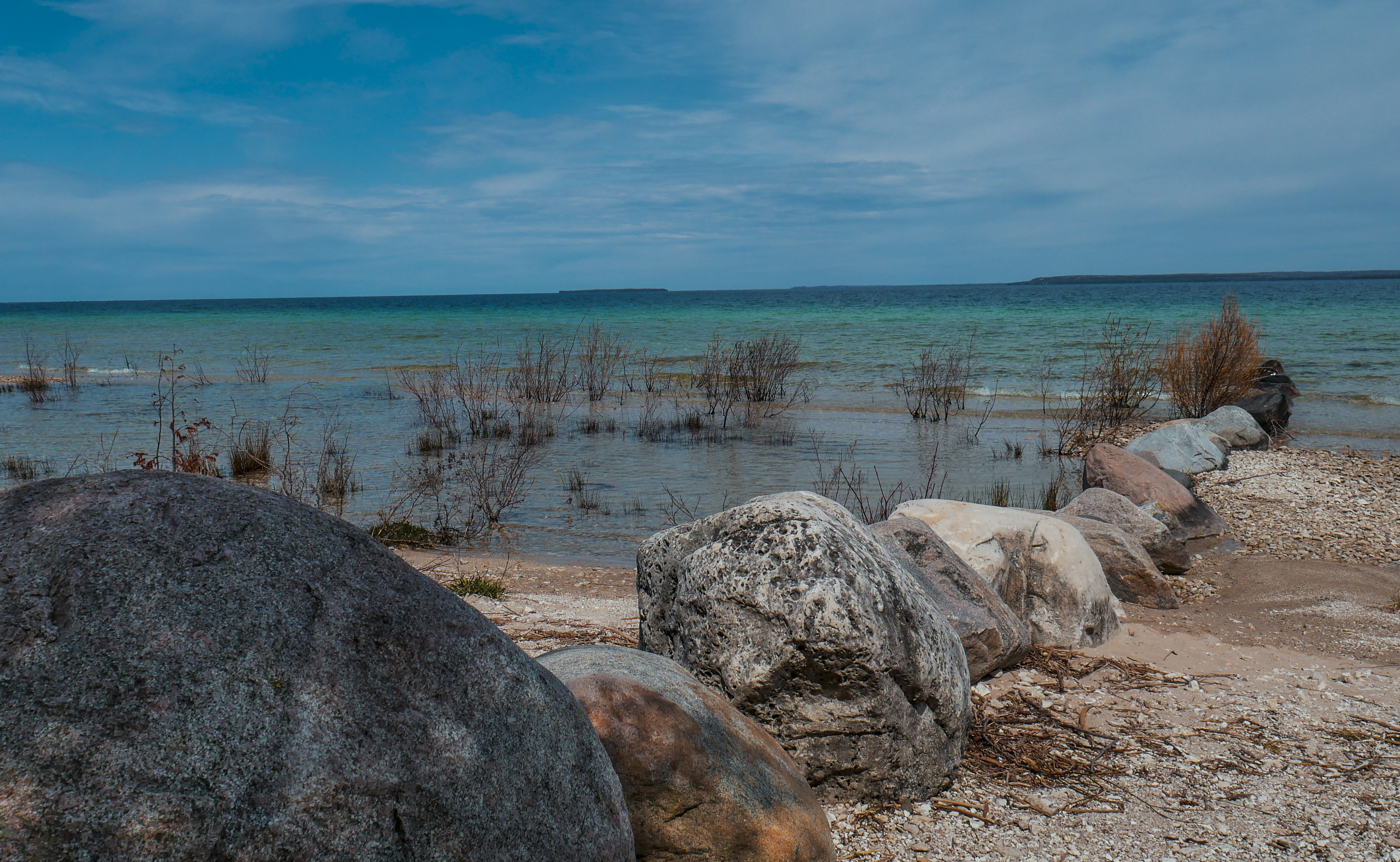 Line of rocks along a tranquil shoreline